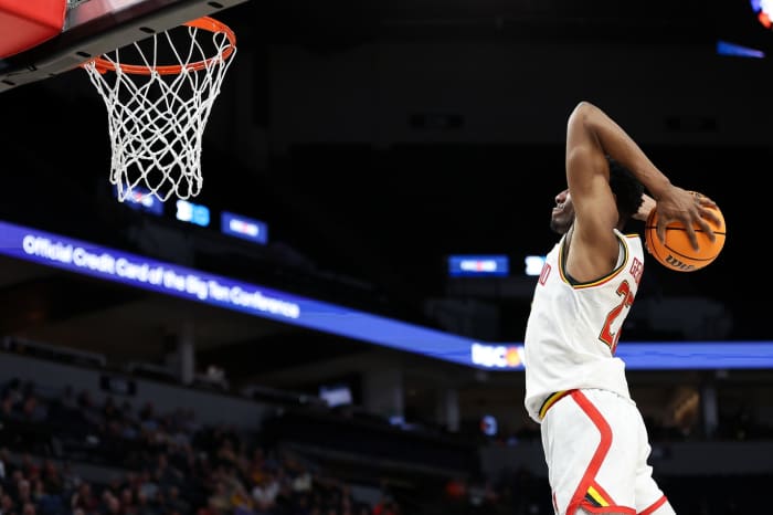 Mar 13, 2024; Minneapolis, MN, USA; Maryland Terrapins forward Jordan Geronimo (22) dunks against the Rutgers Scarlet Knights during the second half at Target Center.